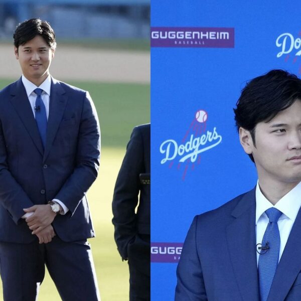 Shohei Ohtani places on a Los Angeles Dodgers jersey for the primary…