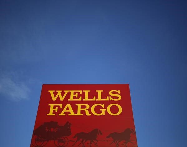 Wells Fargo studies This fall revenue rise however warns of decrease internet…