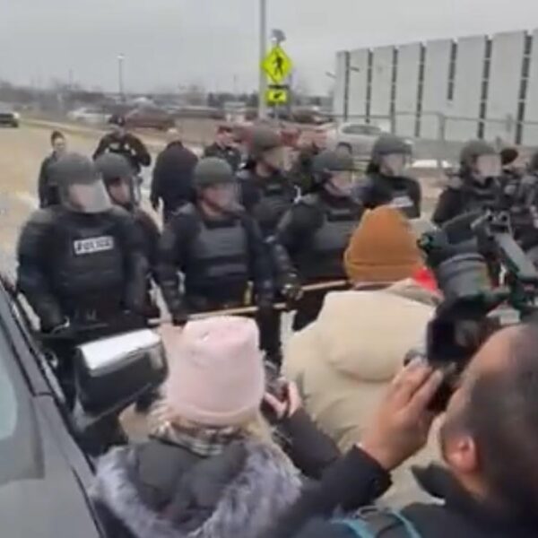 Protestors Line the Road to Greet Joe Biden in Detroit; Police in…