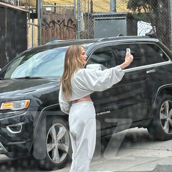 Jennifer Lopez Takes Selfies in Front of Her Own ‘Atlas’ Billboard