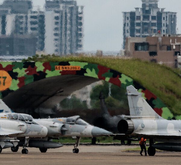 Chinese Military Drills Surround Taiwan, and U.S. Plans to Sue Music Giant