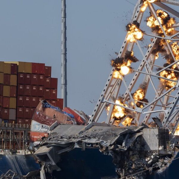 Collapsed Baltimore bridge is demolished as explosives clear metal part from Dali