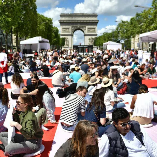 The Champs-Elysées hosted Paris’s largest picnic: A photograph function