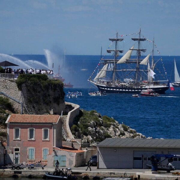 Olympic torch arrives in Marseille on well-known ship amid celebration, tight safety