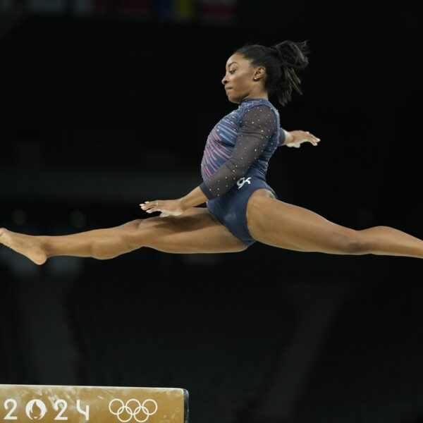 Simone Biles shakes off ankle ache, qualifies first for Olympics all-around
