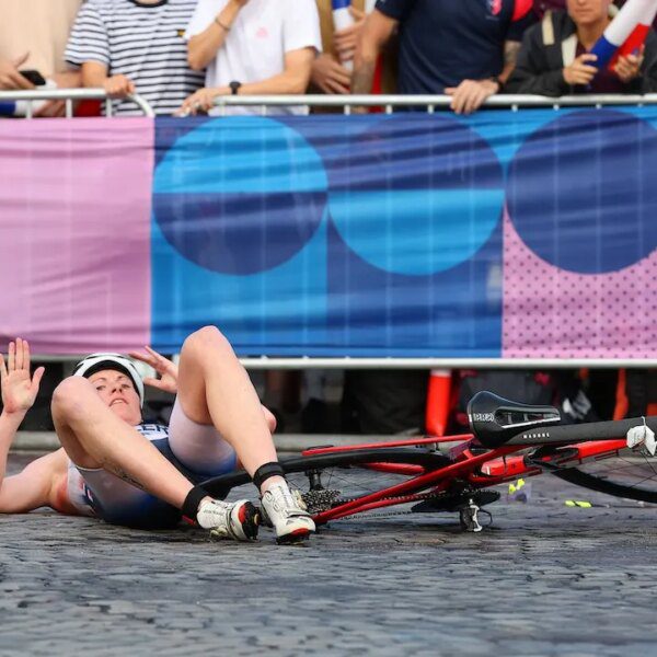 Paris streets littered by bicycle crashes throughout Olympics triathlon amid moist situations