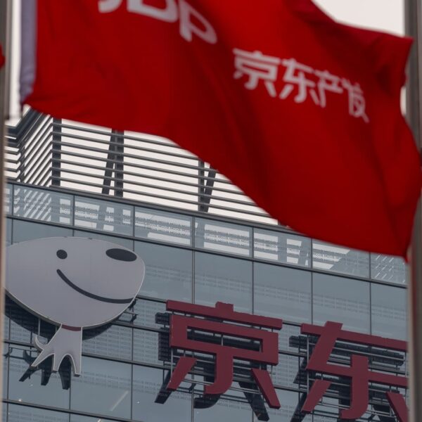 JD.com shares inch up after saying $5 billion share buyback