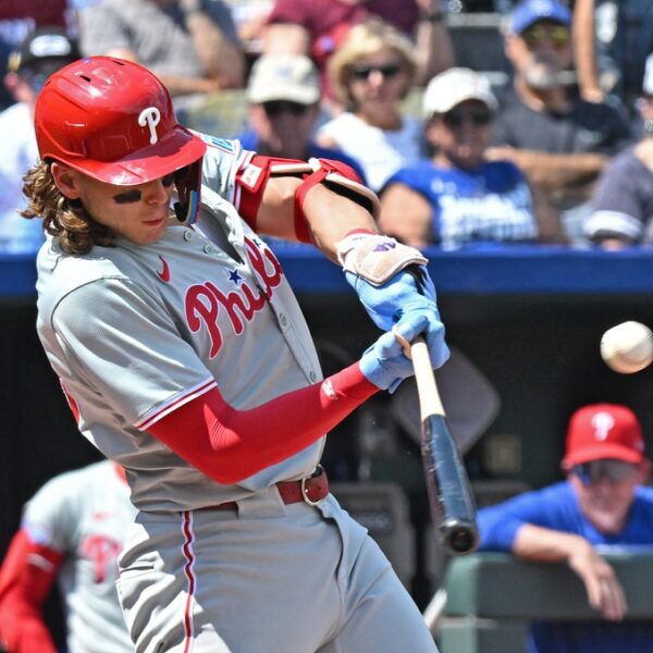 Phillies’ 16-hit assault overpowers Royals, clinches collection win