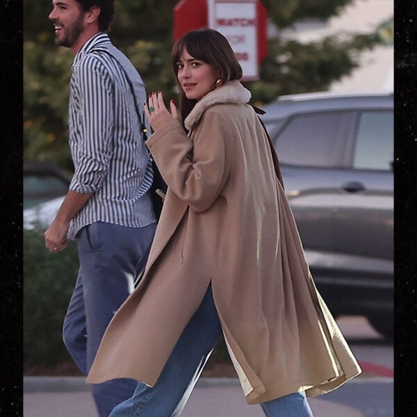 Dakota Johnson Flaunts Engagement Ring After False Report of Chris Martin Split