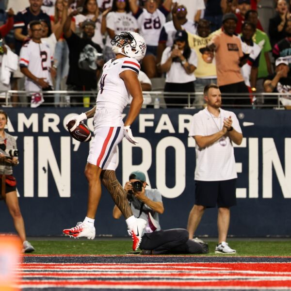 Tetairoa McMillan (304 receiving yards) helps No. 21 Arizona outlast New Mexico