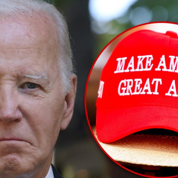 President Biden Wears Trump Hat For Unity, White House Says