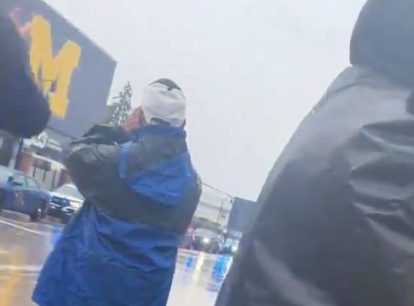 Michigan Fans Wait within the Rain to Boo Tampon Tim at Big…