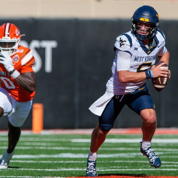 West Virginia runs roughshod (389 yards) over Oklahoma State in simple win