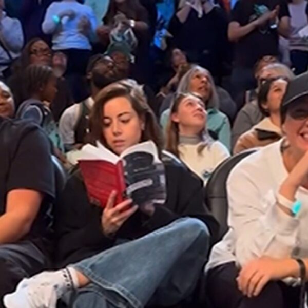 Aubrey Plaza Pretends To Read Book During WNBA Finals