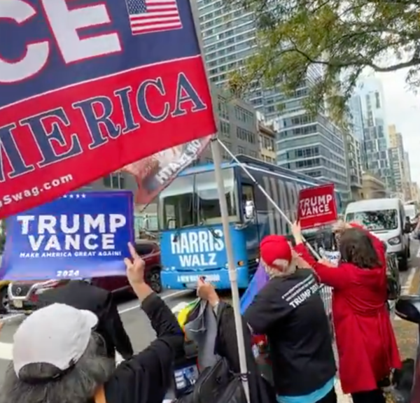 In Deep Blue NYC, Tim Walz’s Bus Greeted by Vocal Trump Supporters…