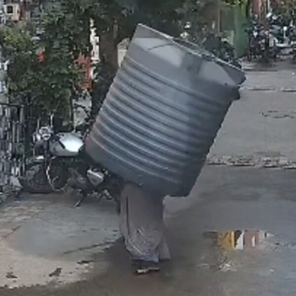 Video captures water tank falling on girl — however she miraculously escapes harm