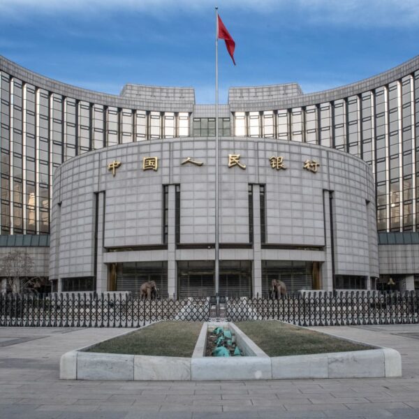 China holds its benchmark lending charges as Beijing assesses stimulus measures