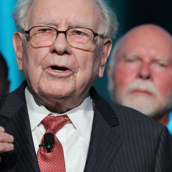 Warren Buffett notes mortality, pledges $1 billion in Berkshire inventory