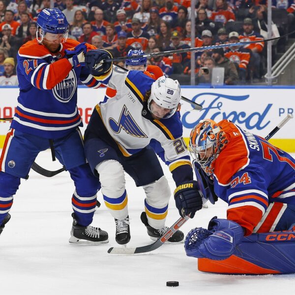 Oilers keep sizzling, double up Blues