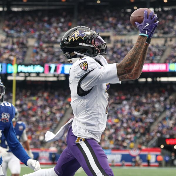 Ravens WR Rashod Bateman sporting a strolling boot