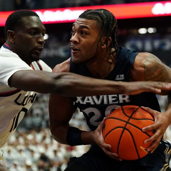 No. 11 UConn holds off feisty Xavier in Big East opener