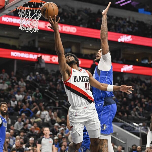 Closing 18-2 burst vaults Mavericks over Trail Blazers