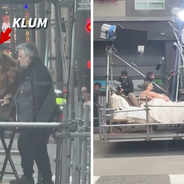 Heidi Klum Looks on While Models Pose in Underwear on Flatbed Truck