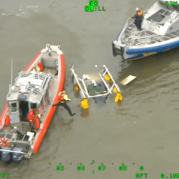 Aerial footage reveals authorities dashing into the Hudson River to get well…