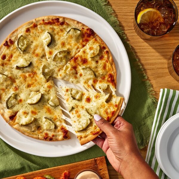‘Debatable’ pizza with dill pickles involves freezer sections of grocery shops with…