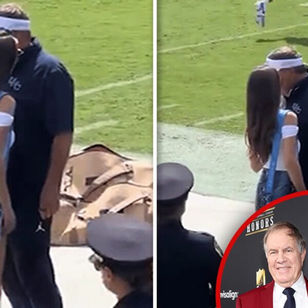 Jordon Hudson Chats With Bill Belichick In Miniskirt Before UNC Football Game