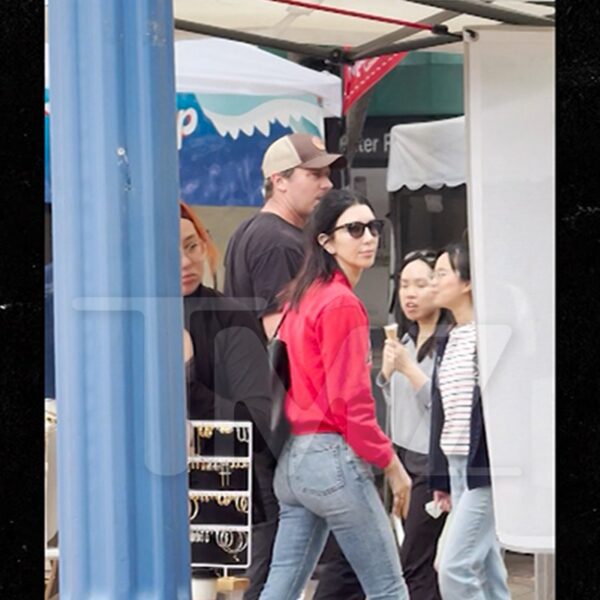 Armie Hammer Grabs Lunch, Walks Through Farmer’s Market with Mystery Woman