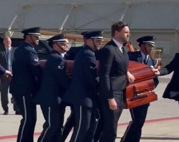 Vice President Vance walks alongside Kirk’s casket earlier than flight on Air…