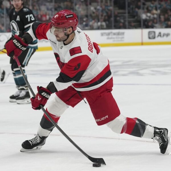 Rookie goalie wins debut as Hurricanes down Sharks