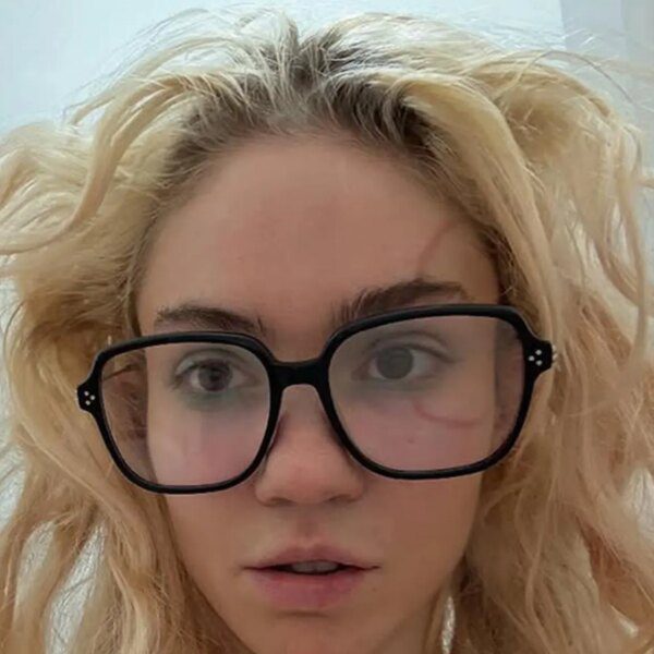 Grimes Shows Off New Face Tattoo
