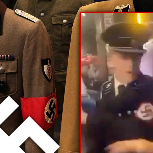 Nazi Sympathizer in Gestapo Uniform Smashes Woman With Beer Stein on Video