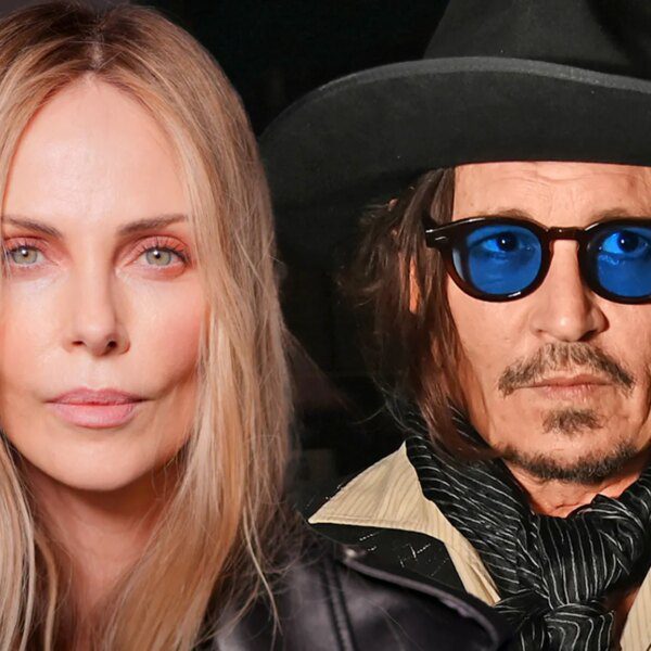 Charlize Theron Seemingly Gives Cold Shoulder to Johnny Depp at Dior Show