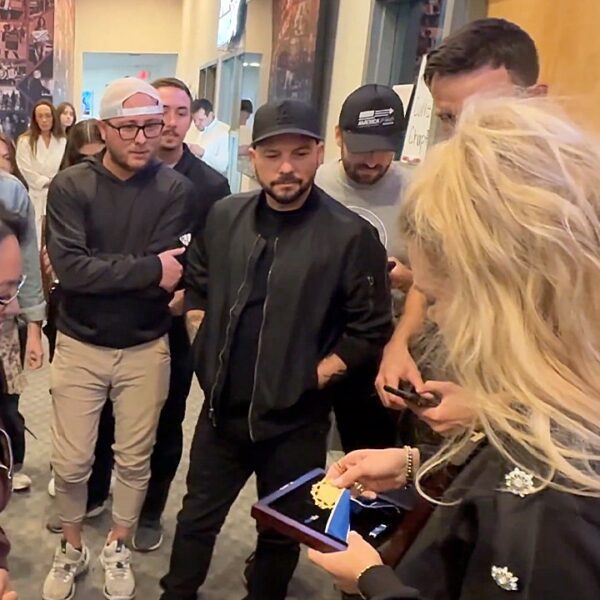 Erika Kirk exhibits Charlie Kirk’s Medal of Freedom to Turning Point workers