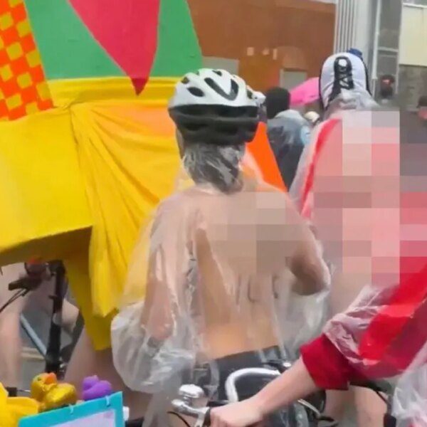 Nude cyclists stage uncommon protest at ICE detention middle in Portland