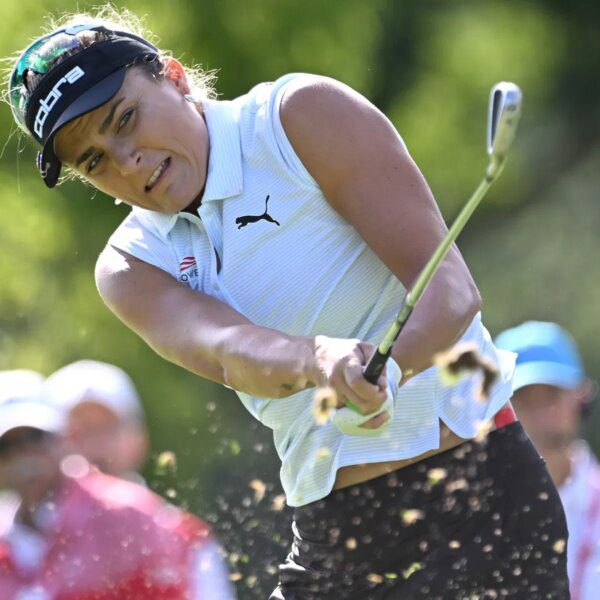 Lexi Thompson types in navy blue gown throughout gala outing with fiance