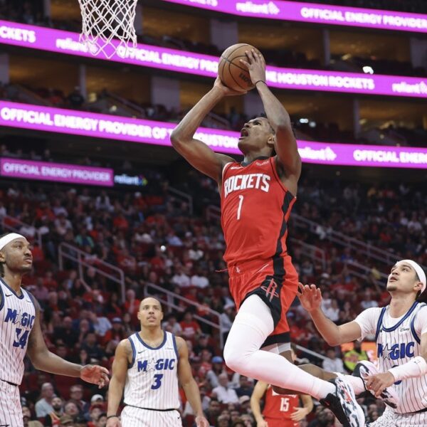 Rockets rally from down 11 in 4th to high Magic in OT