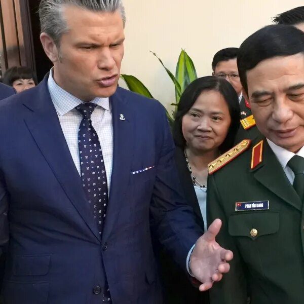 Hegseth reaffirms Vietnam partnership and palms over a leather-based field, belt and…