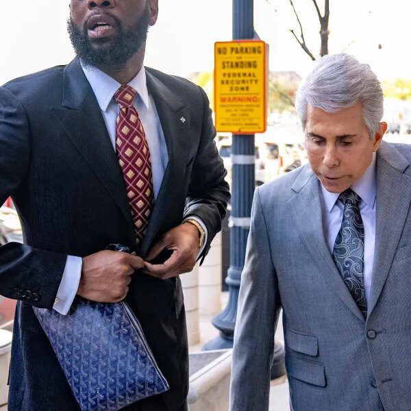 Rapper sentenced to 14 years for funneling thousands and thousands from a…