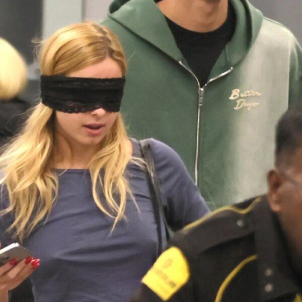 Addison Rae Wears Eye Mask On Her Way Out of Airport