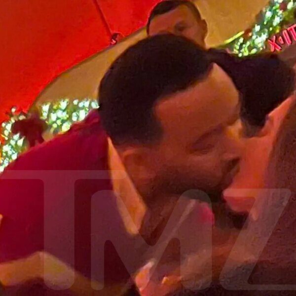 Chrissy Teigen Makes Out With Husband John Legend After Tooth Fail