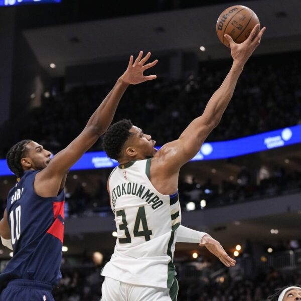 CJ McCollum nets jumper with 1.2 seconds left as Wizards nip Bucks