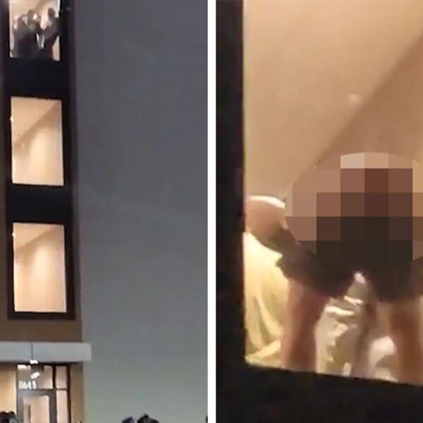 Man Moons Anti-ICE Protesters From Hotel Window, on Video