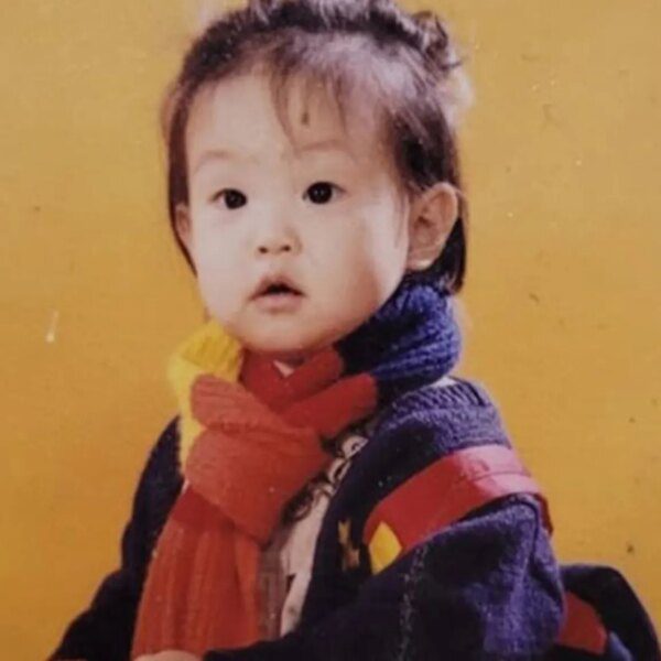 Guess Who This Kid In Her Scarf Turned Into!