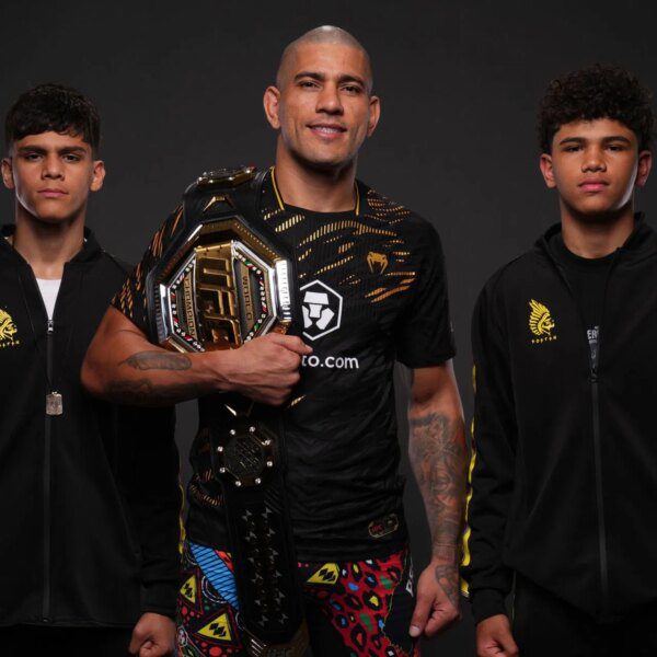 Alex Pereira reacts after sons Alessandro and Lohan win grappling contests