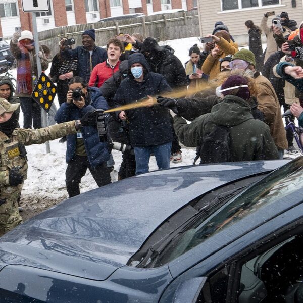 Federal brokers concerned in Minneapolis taking pictures, DHS says suspect was armed