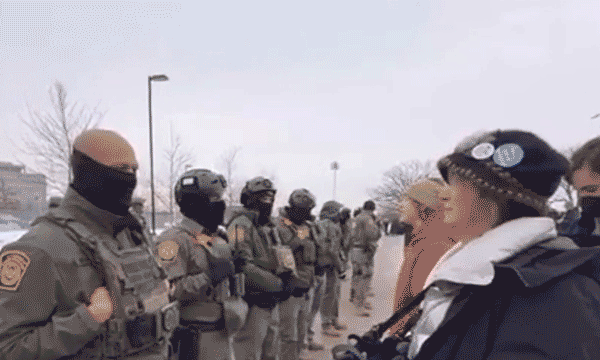 Border Patrol agent hugs protester in video amid Minnesota immigration conflict